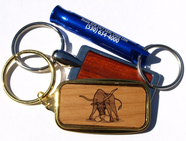 ZLazr Laser Engraving - Wooden & Metal Keychains with detailed laser engraving.